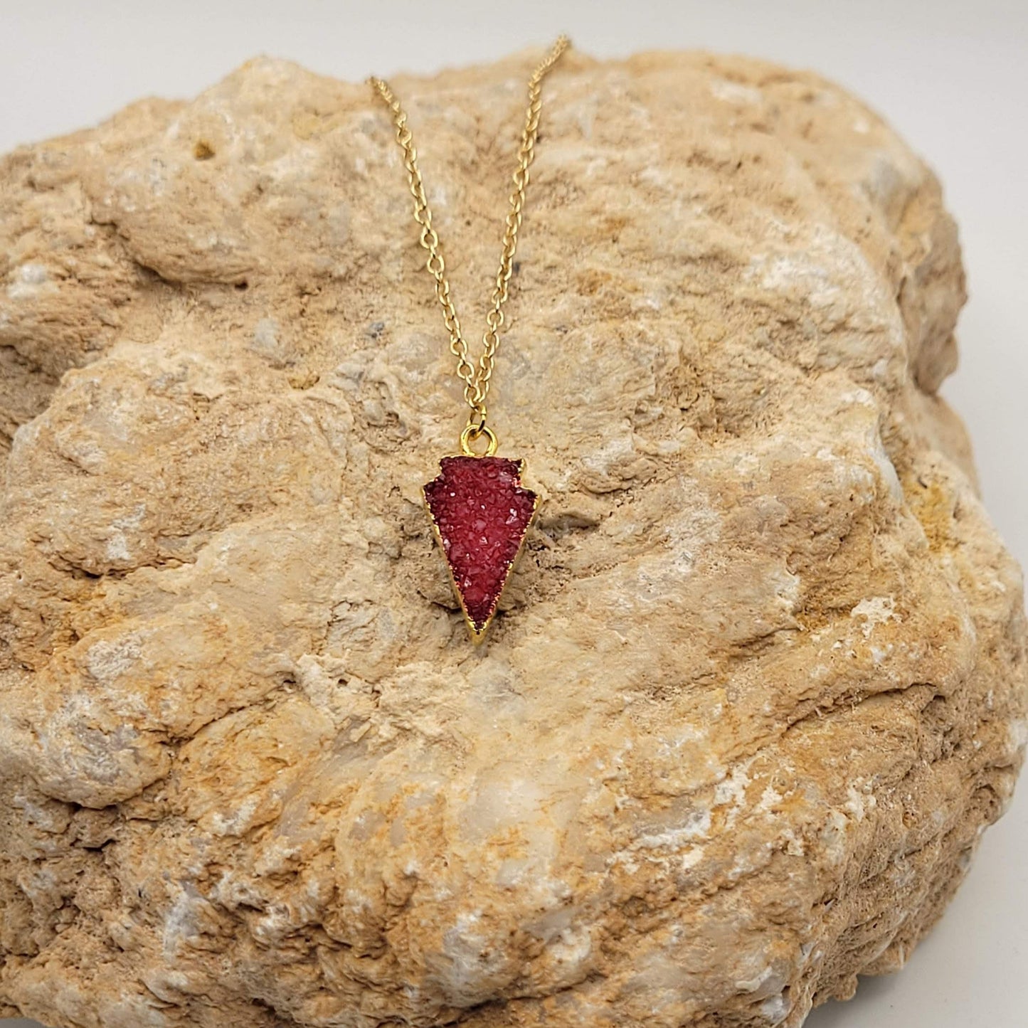 red druzy arrowhead pendant
